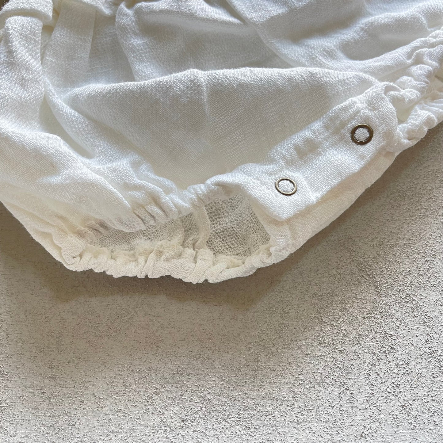 
                  
                    angel linen babysuit
                  
                