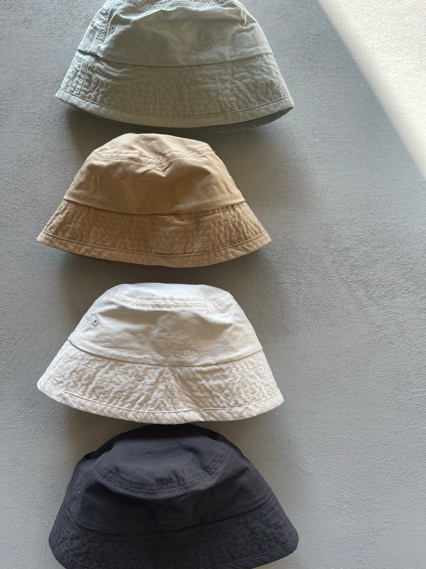 
                  
                    string bucket hat
                  
                