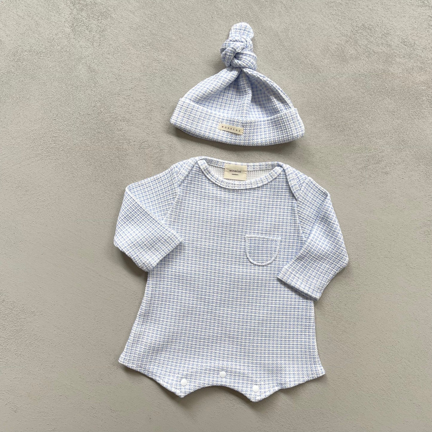 
                  
                    check waffle babysuit set
                  
                